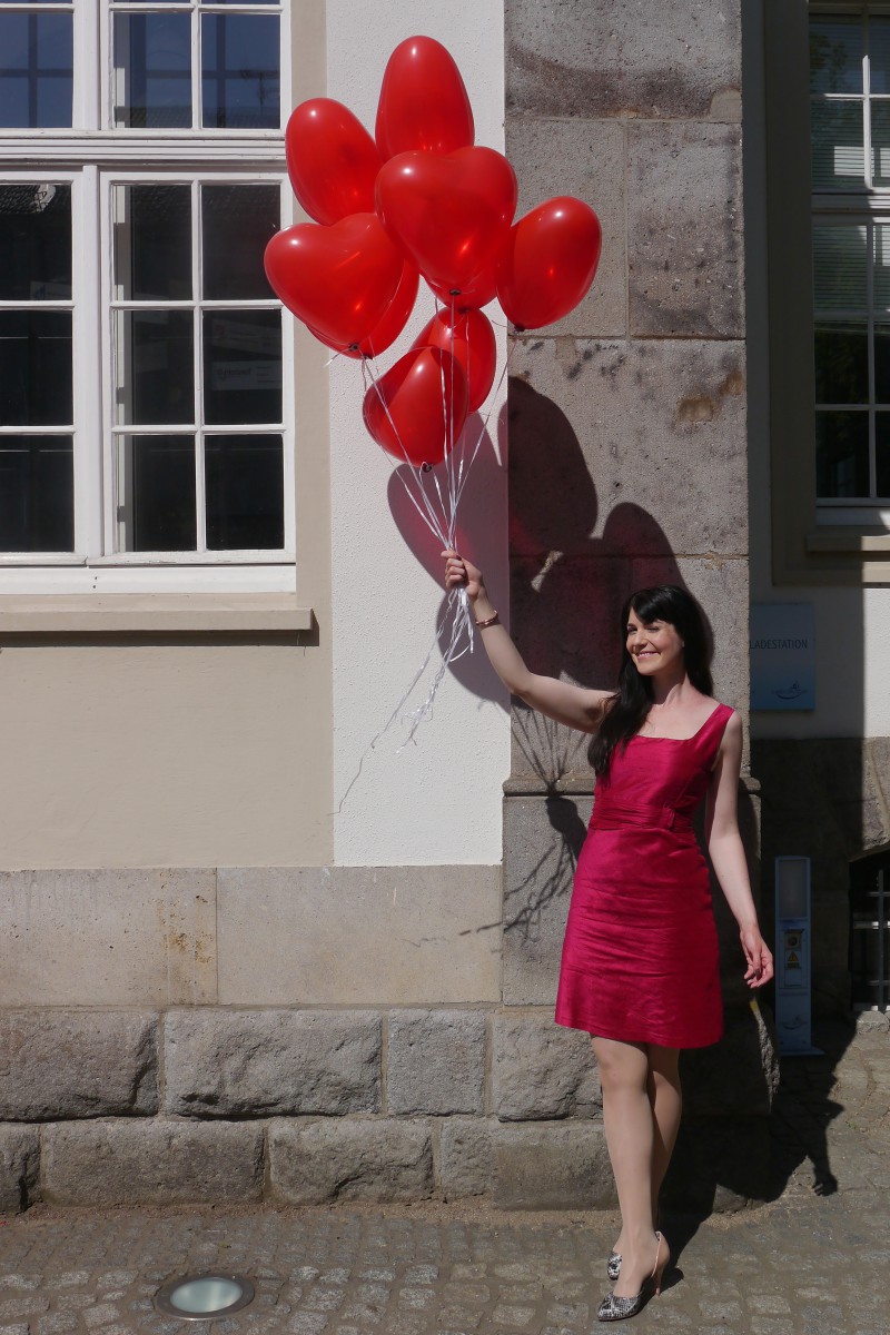 pink wild silk dress and red heart balloons