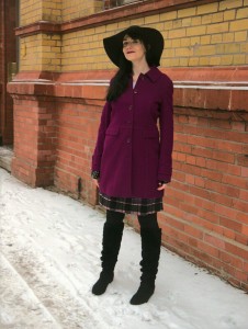 pink statement coat and fedora