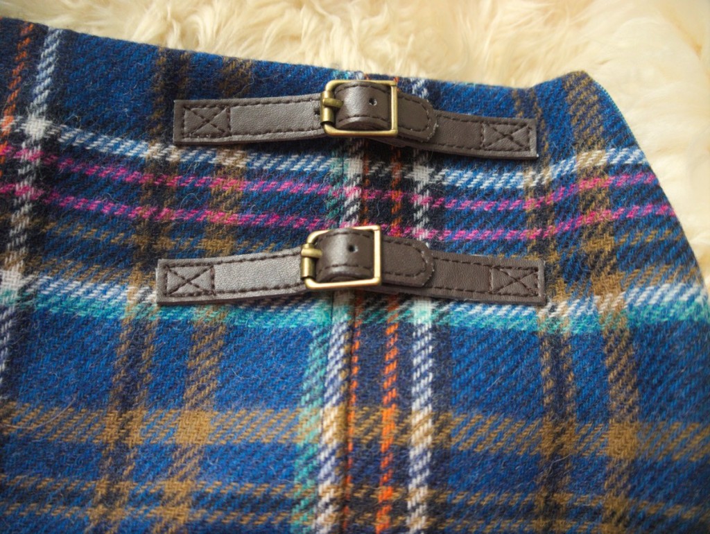 Navy, brown and pink Boden tweed check kilt with faux leather buckle detail