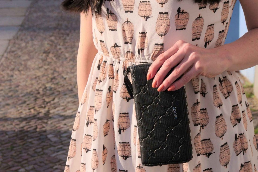 Birdcage print pastel dress and black signature cornflower clutch 