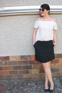 white off shoulder blouse and black skirt