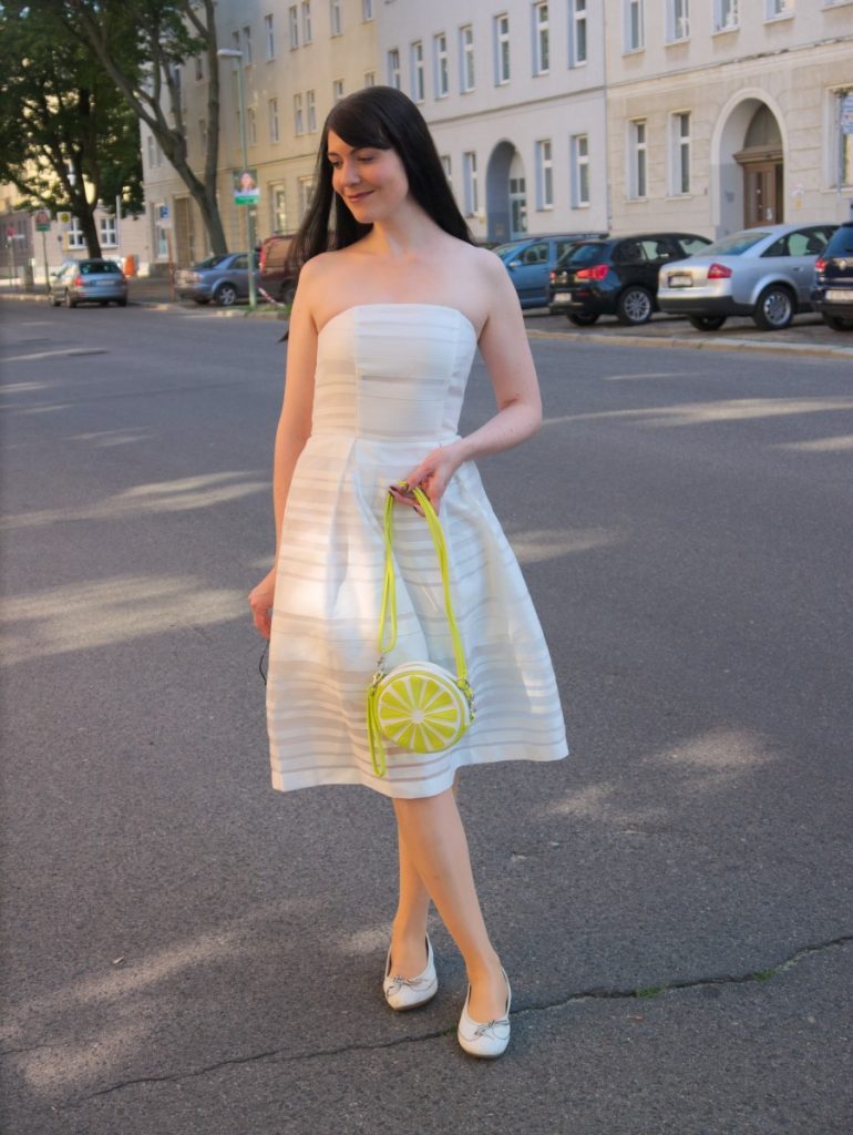 white organza dress and lemon bag