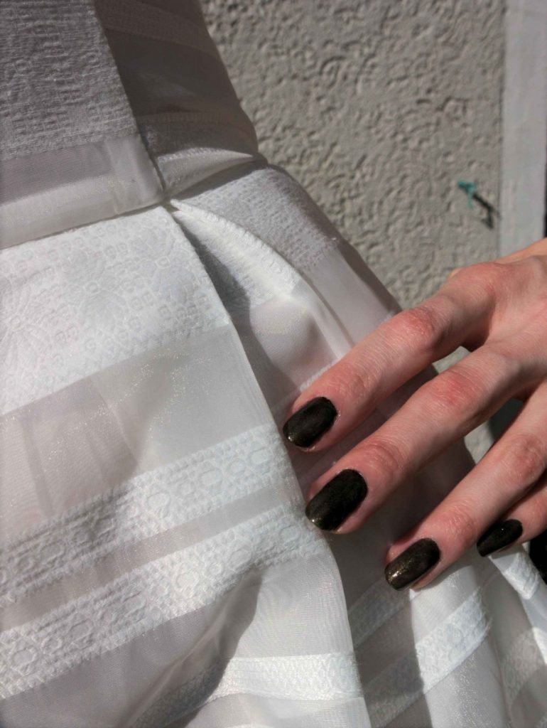 white organza dress detail and Vampire's Love nailpolish