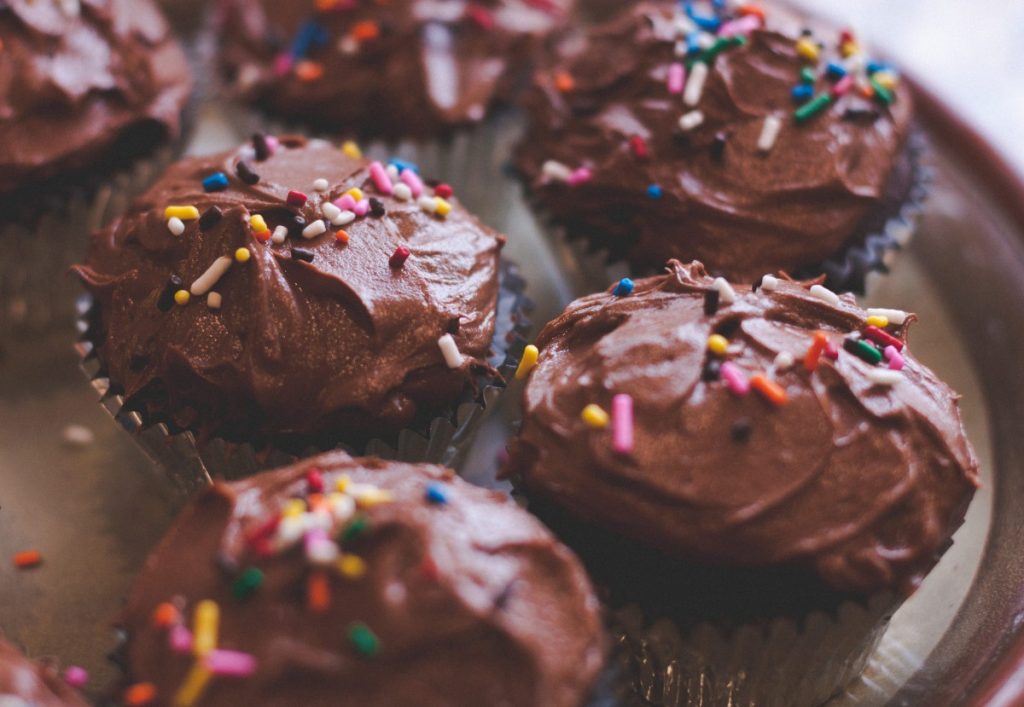 chocolate cupcakes with sprinkles unsplash