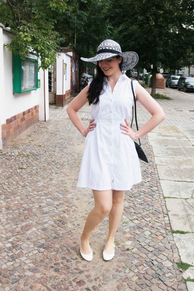 white coven shirt dress and taupe lipstick