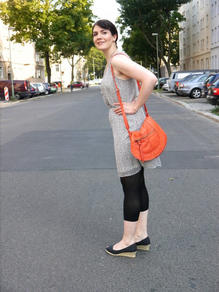 the orange statement bag