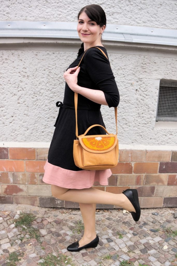 jersey dress and orange bag