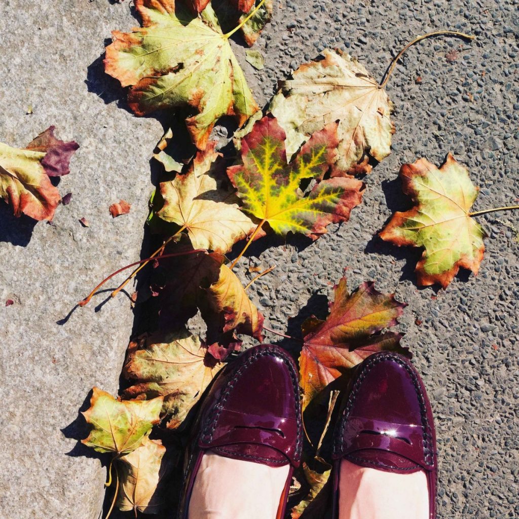 Fall leaves and patent leather loafers