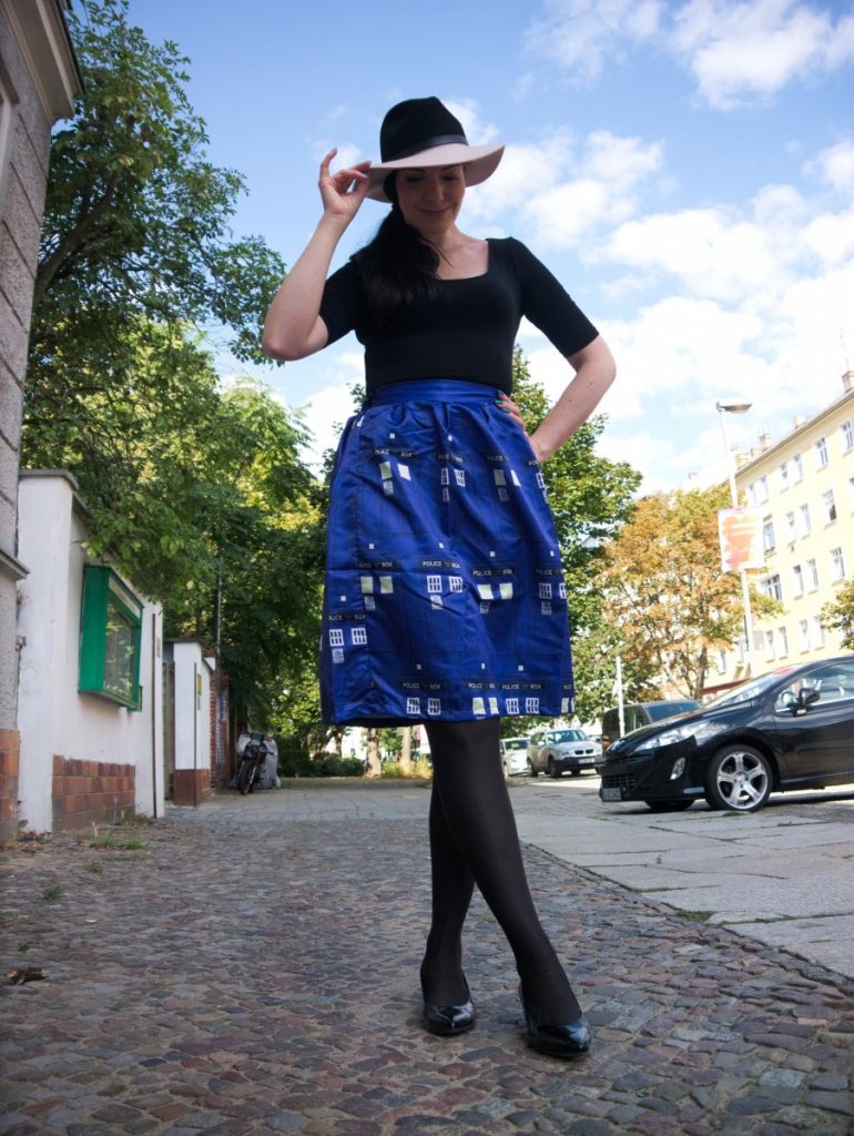 cobalt blue Tardis skirt and fedora