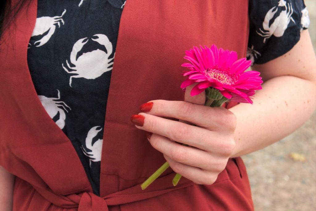 crab print top and terracotta longline vest