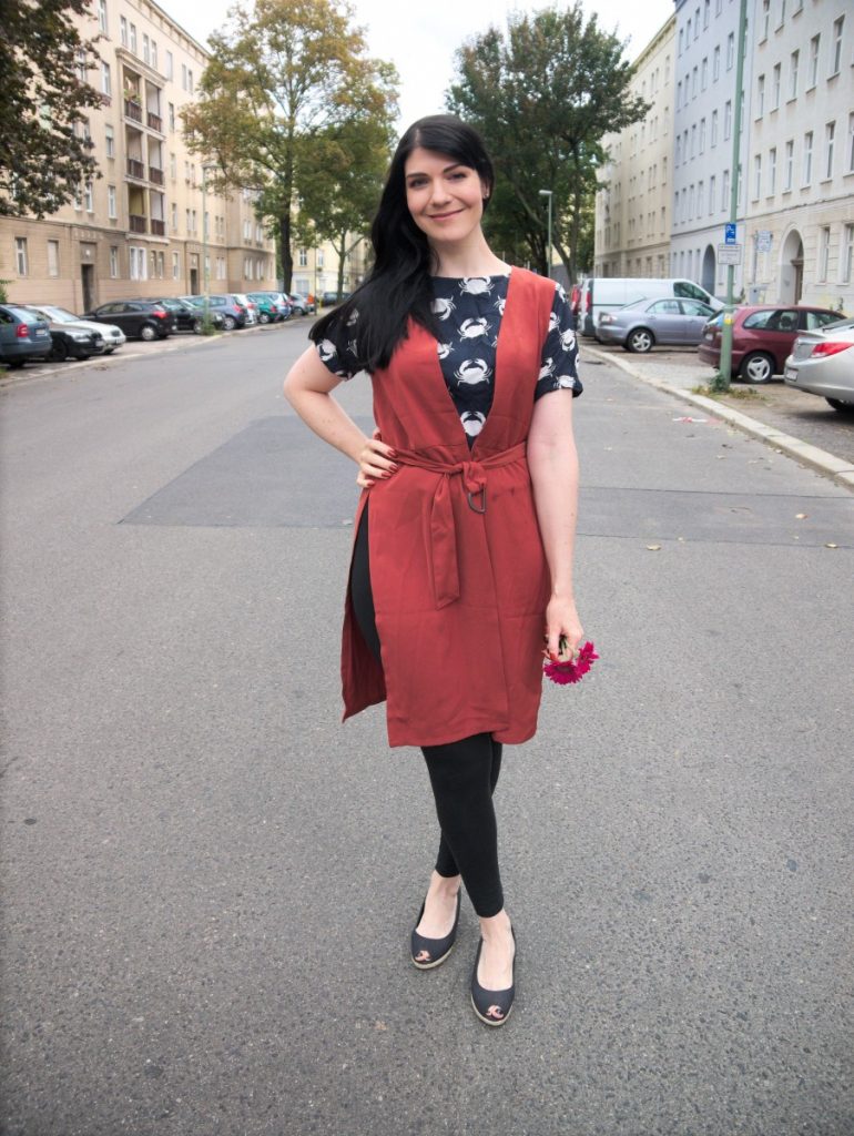 crab print top and terracotta longline vest