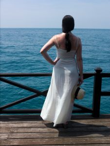 white dress and blue sea