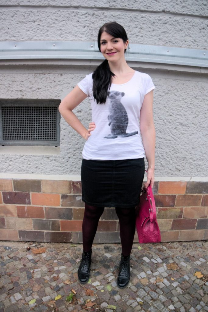 casual winter work wear outfit with pixel meerkat shirt and ostrich bag