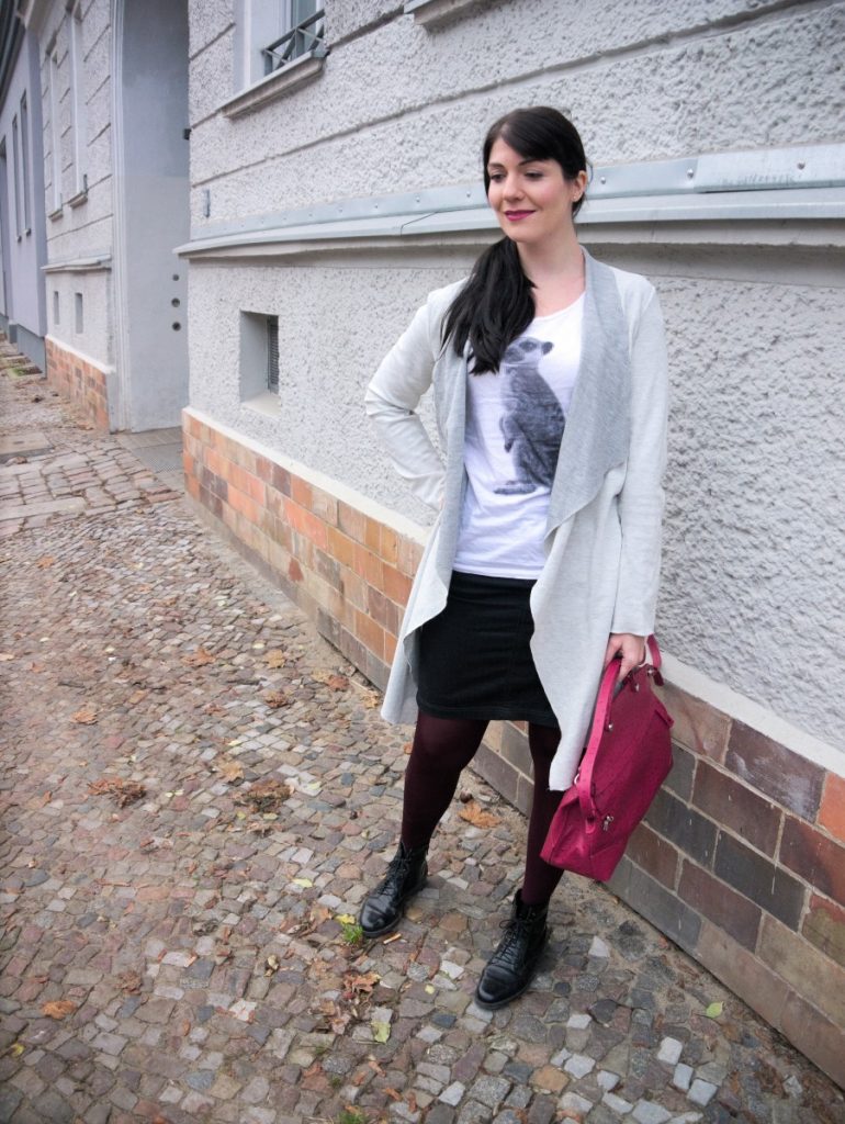 casual winter work wear outfit with pixel meerkat shirt and ostrich bag