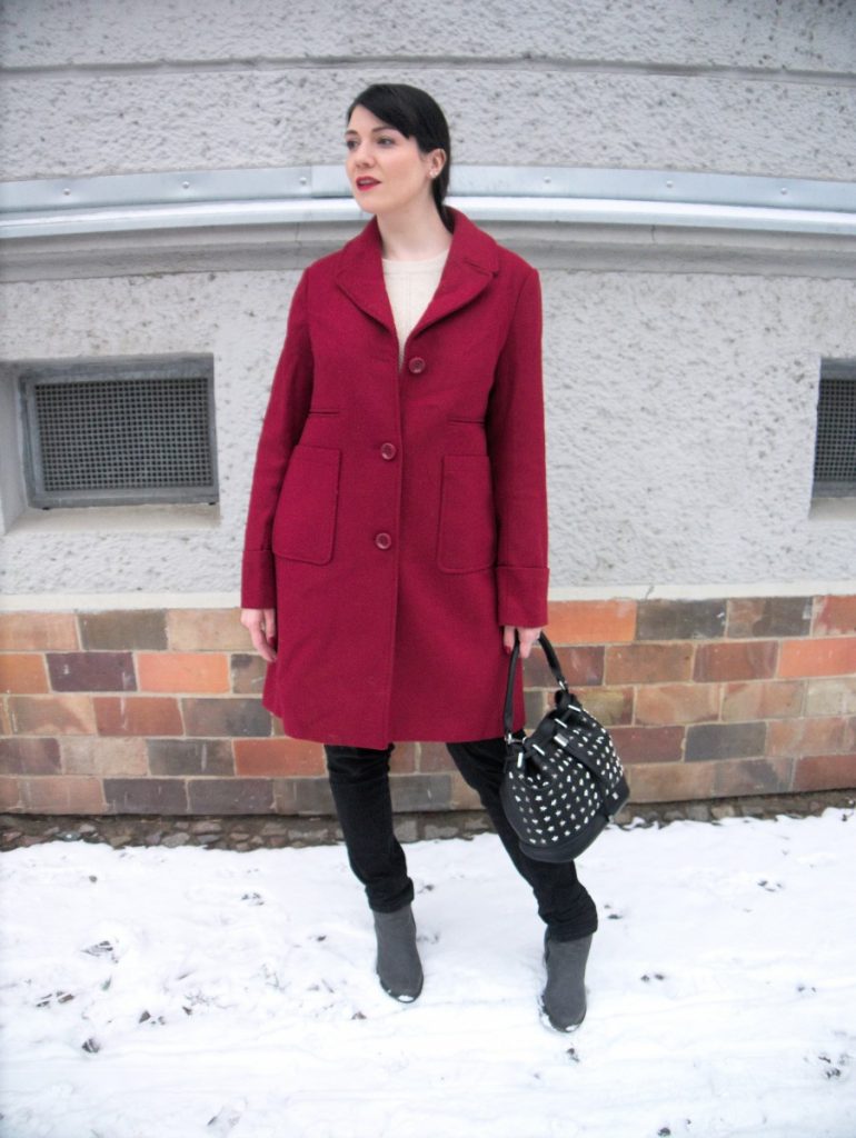 red coat and peplum sweater