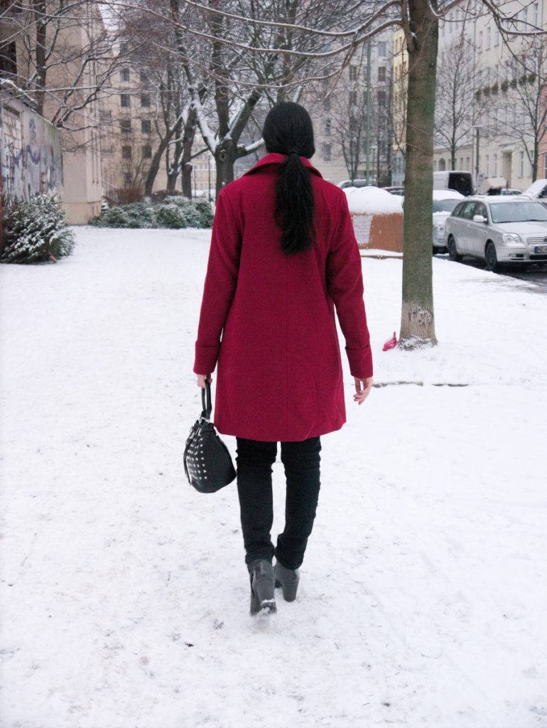 red coat and peplum sweater