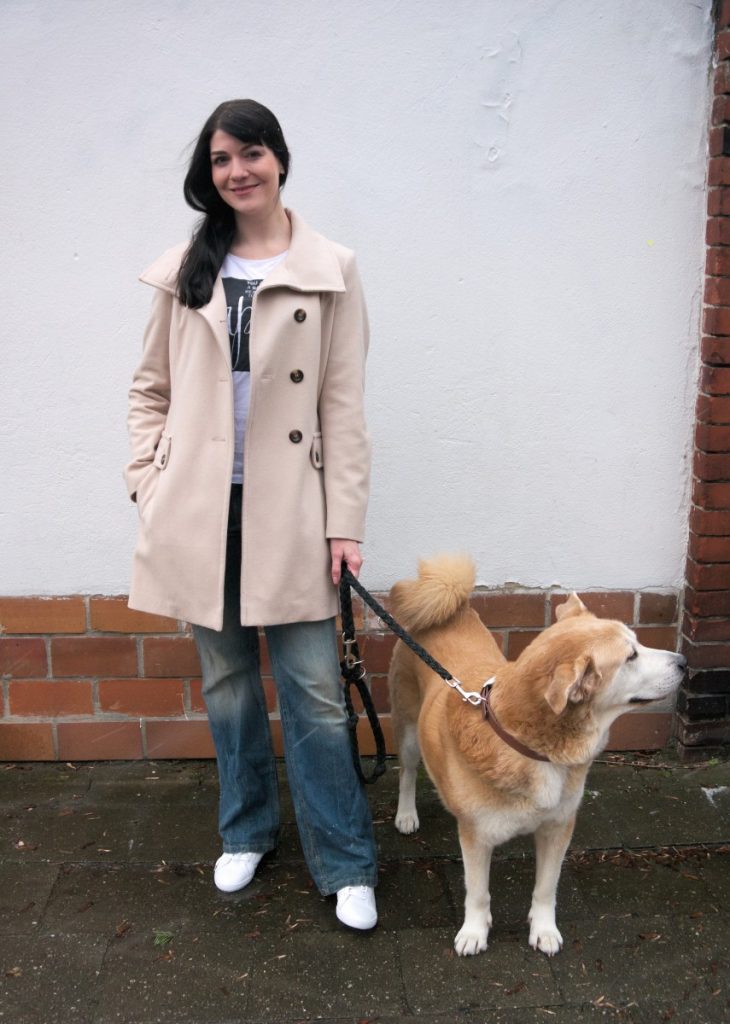 cream wool coat, akita and sneakers