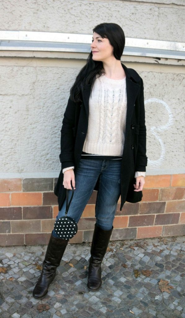 Casual black coat and brown leather boots