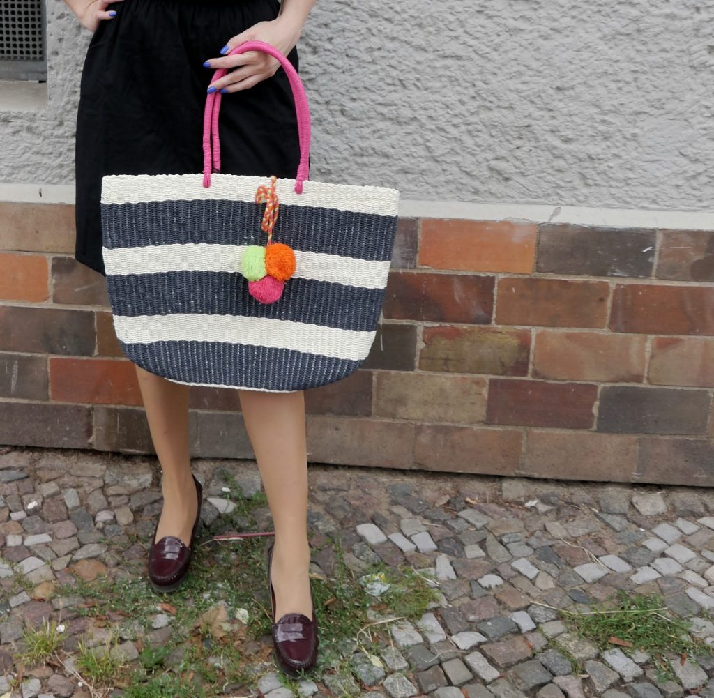 striped straw bag with fluo pom poms and Sally Hansen gel couture nail polish